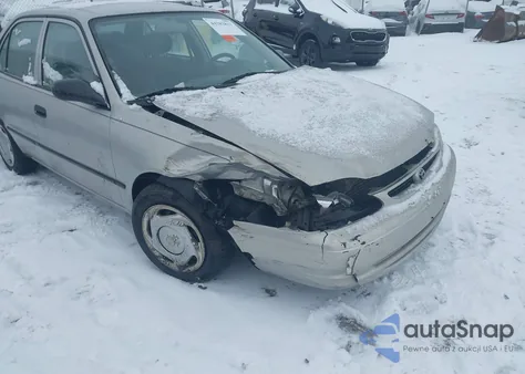 1999 Toyota Corolla Ce from USA, damaged, VIN 1NXBR12E0XZ144241
